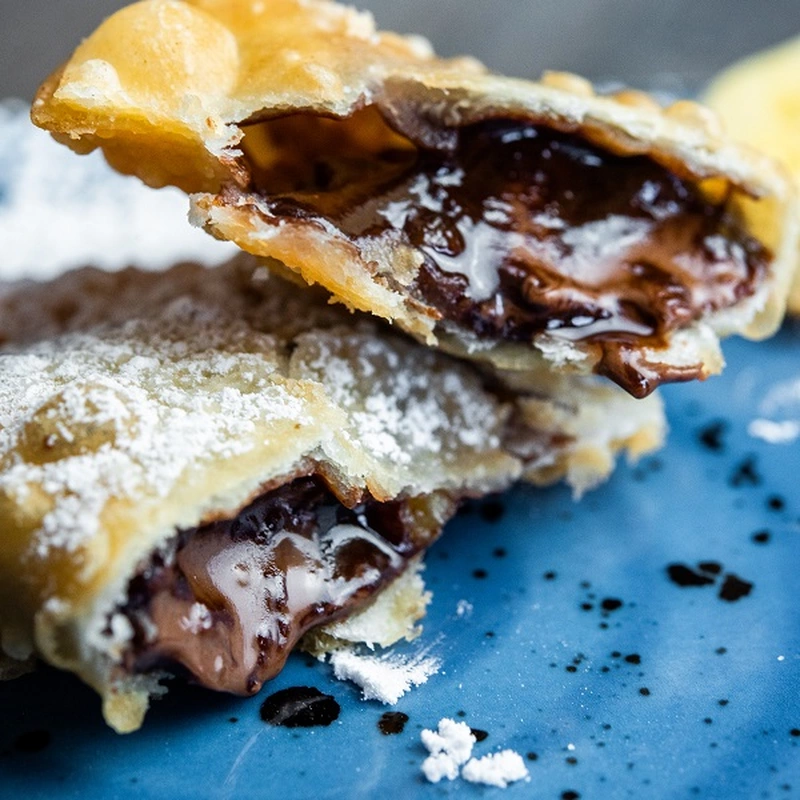 Empanadilla rellena de chocolate y plátano  (Unidad)